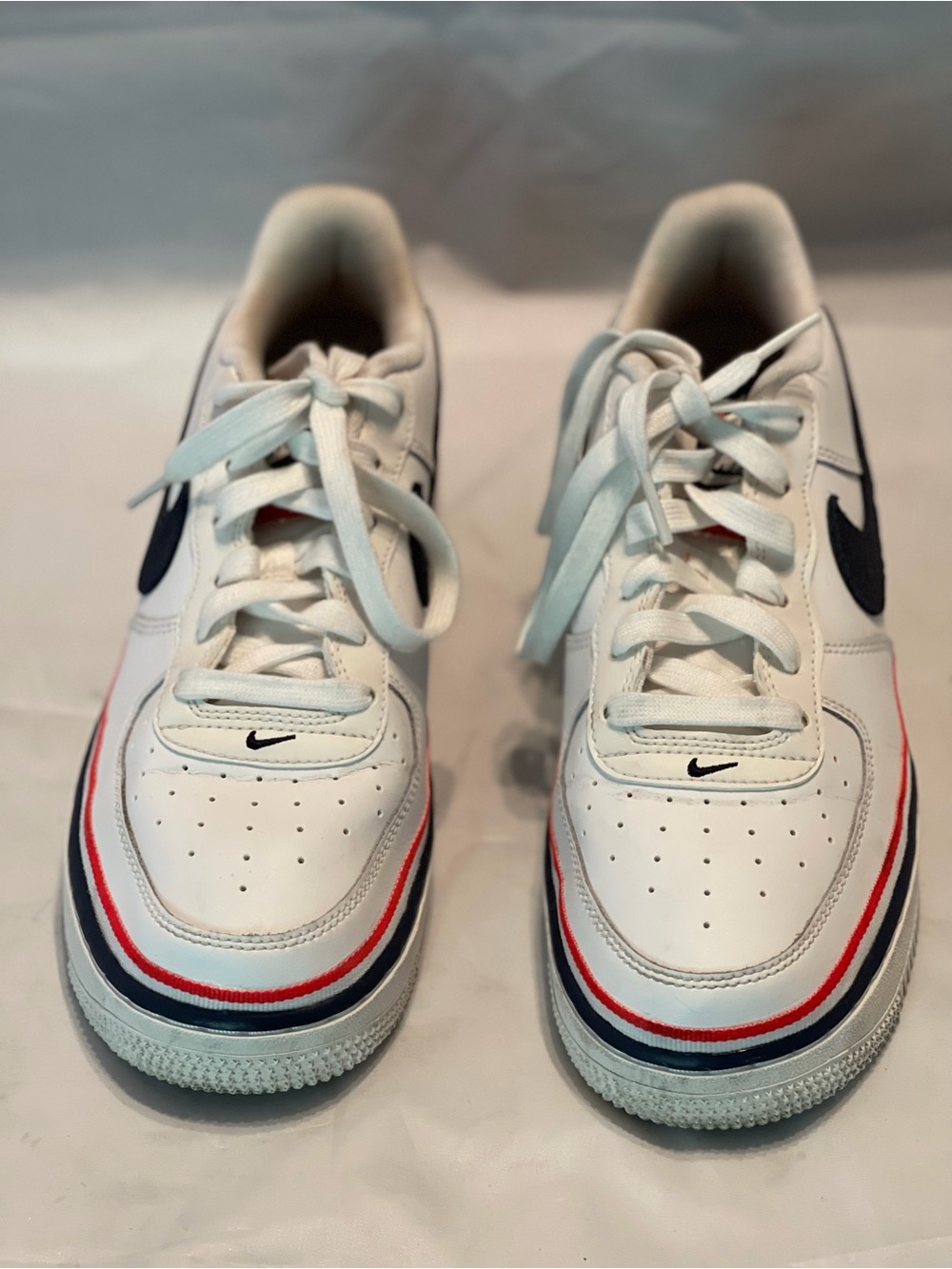 Nike Kids White Sneakers with Navy and Red Stripes